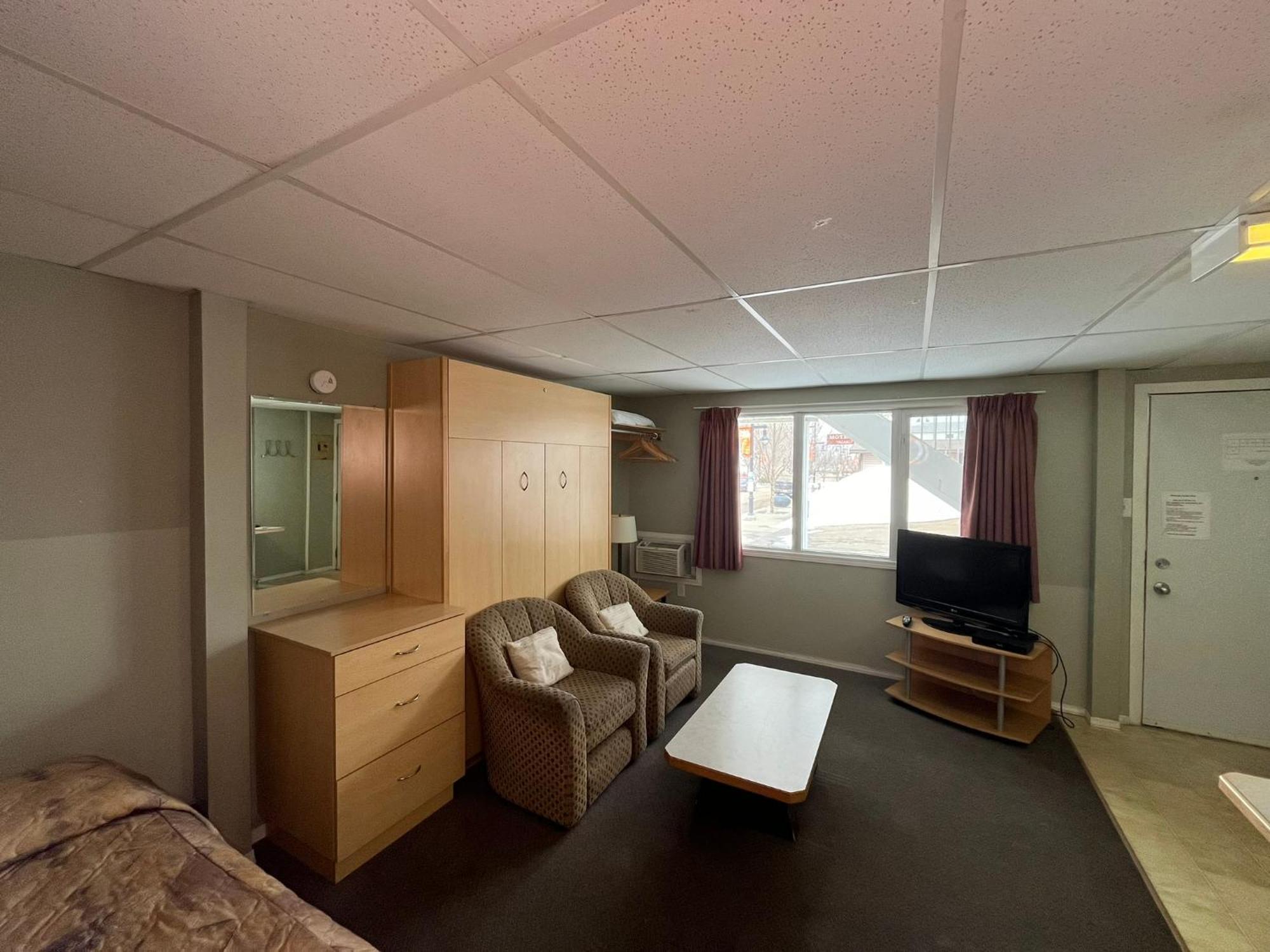 Raccoon Lodge Motel Sylvan Lake Zimmer foto